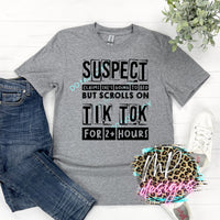 SUSPECT SCROLLS ON TIK TOK